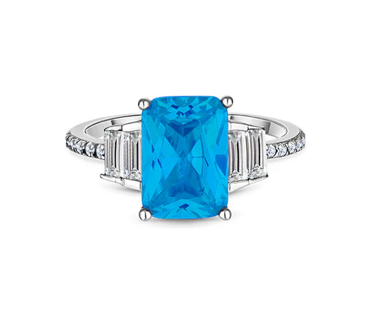 Diamond Style London - Aquamarine coloured ring in rhodium plating with c (Item code: Aquaring6)