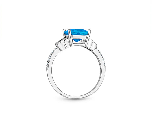 Diamond Style London - Aquamarine coloured ring in rhodium plating with c (Item code: Aquaring6)