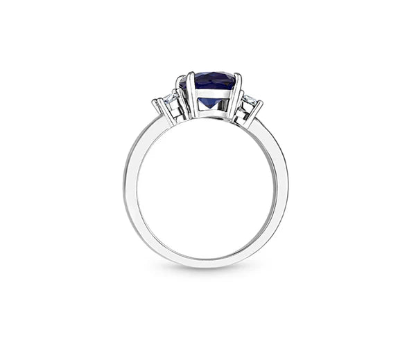 Diamond Style London - Oval cut blue ring with clear side stones in rhodi (Item code: Bluering6)