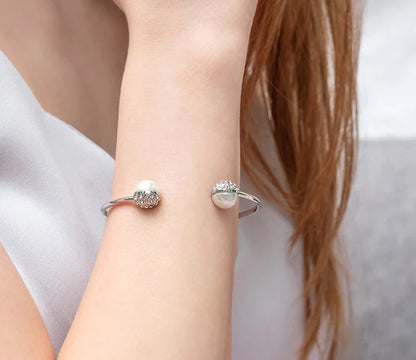 Diamond Style London - Pearl bangle plated in rhodium (Item code: Pearlbangle)